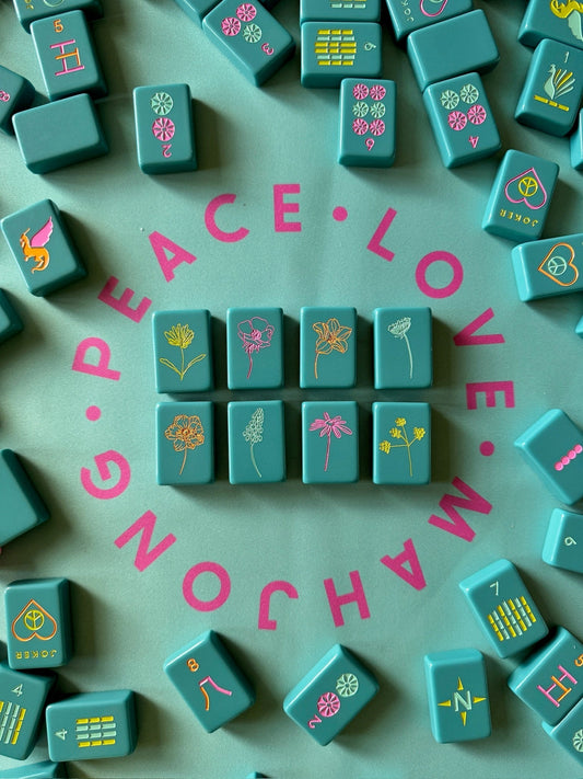 OG Mahj Tiles - Totally Teal set with minimalist design, modern lines, and teal hue arranged on a Peace Love Mahjong mat.