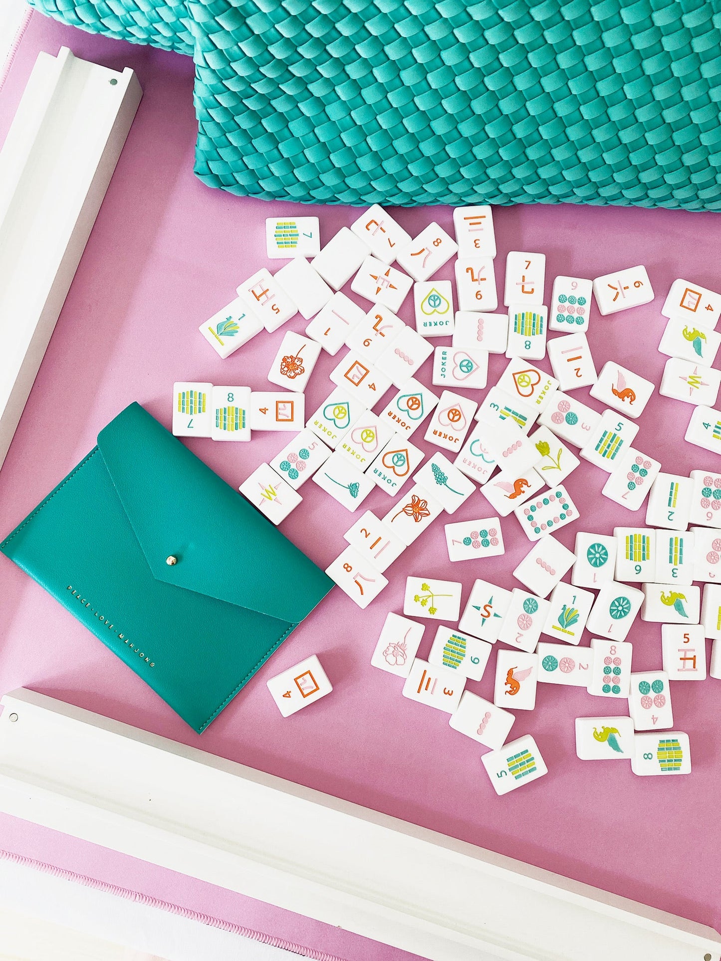 Peace Love Mahjong Gift Card with vibrant mahjong tiles and a teal envelope.
