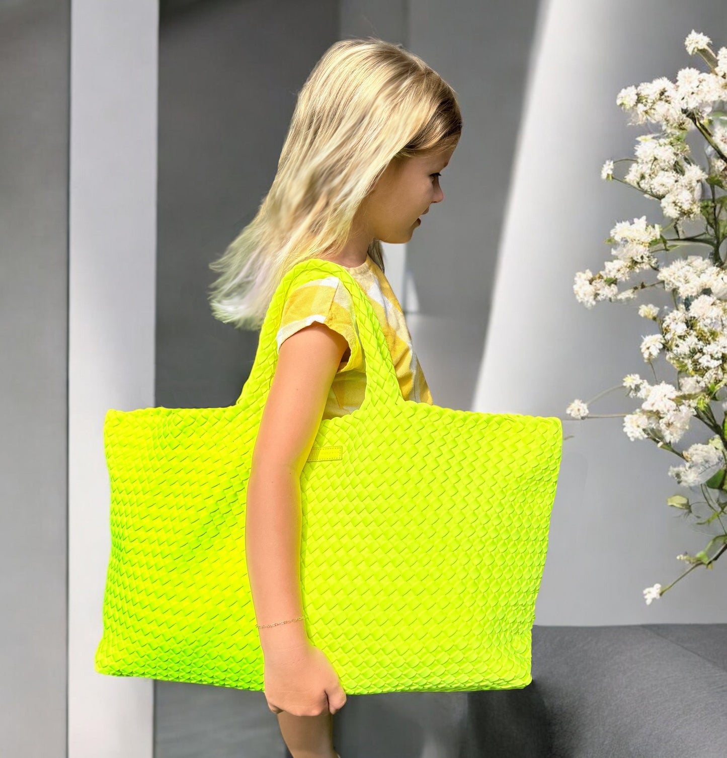 Woven Mahjong carryall in chartreuse, featuring a convenient matching pouch, durable neoprene material, and removable crossbody strap.